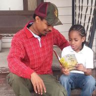 Dad and son reading